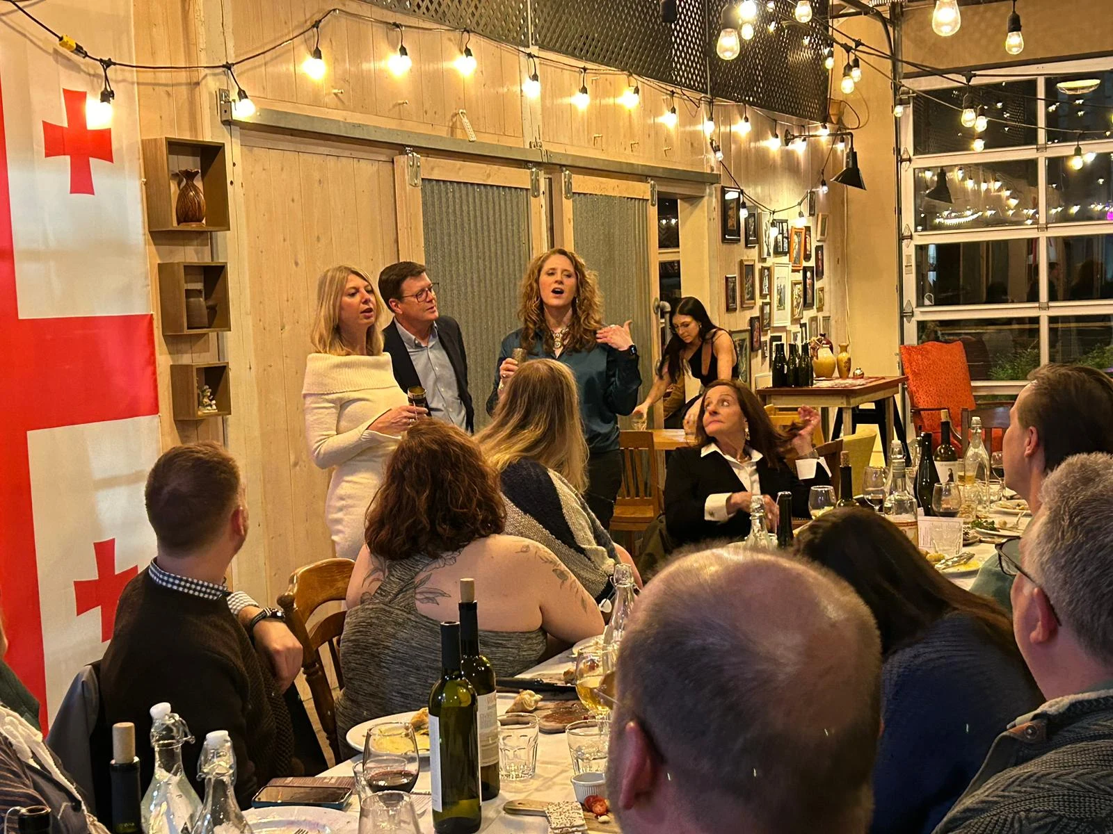 Guests participate in a Supra in a restaurant.